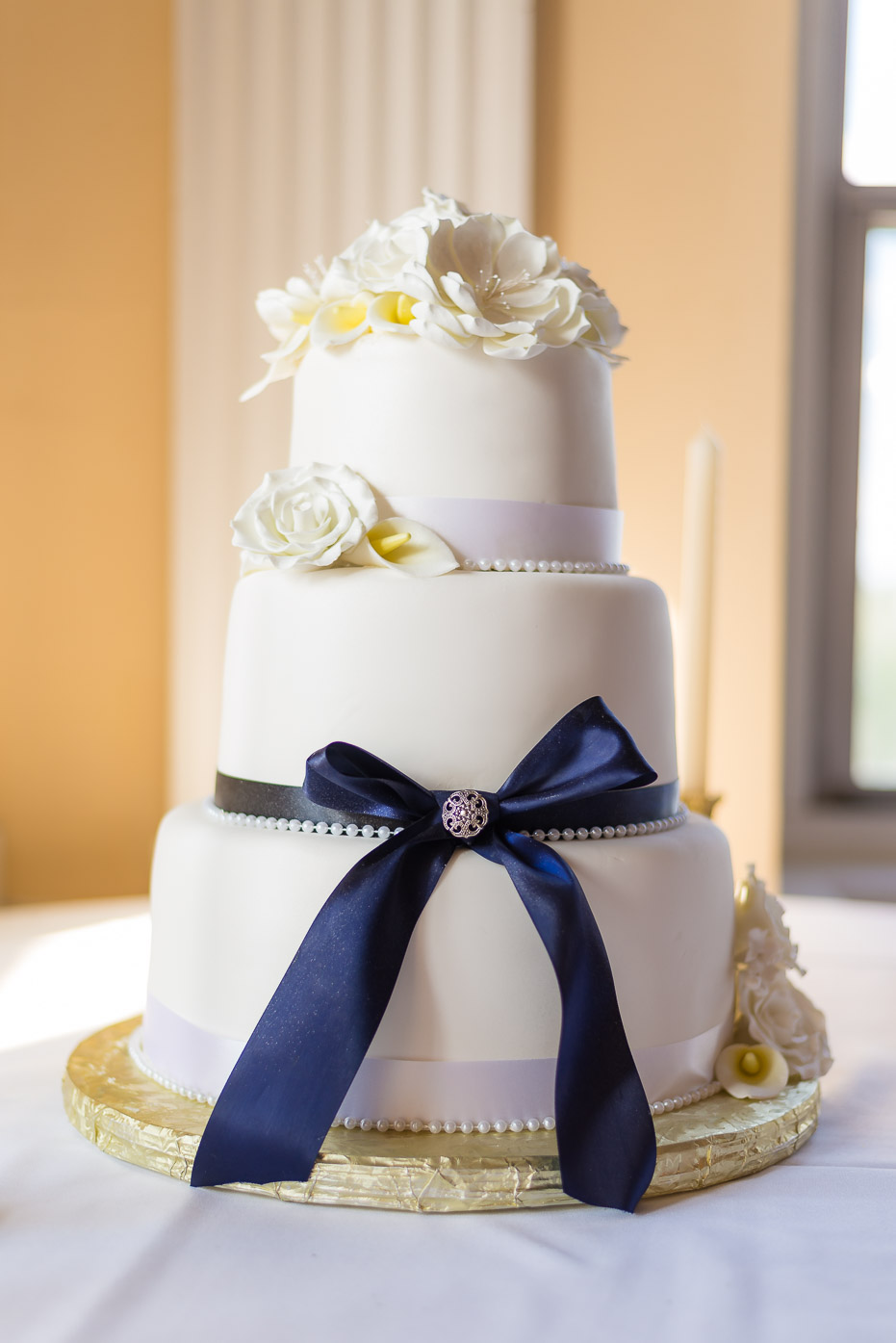 Wedding Cake with Blue Bow and Flowers