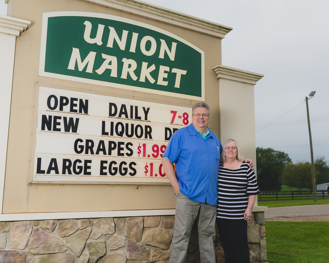 Business Owner Photo by Sign