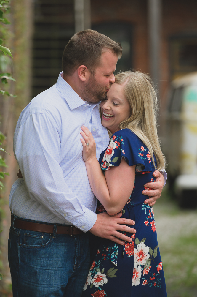  Engagement photos in downtown Goshen Indiana.  Outdoor urban photos in Shanklin Park by wedding photographer. 