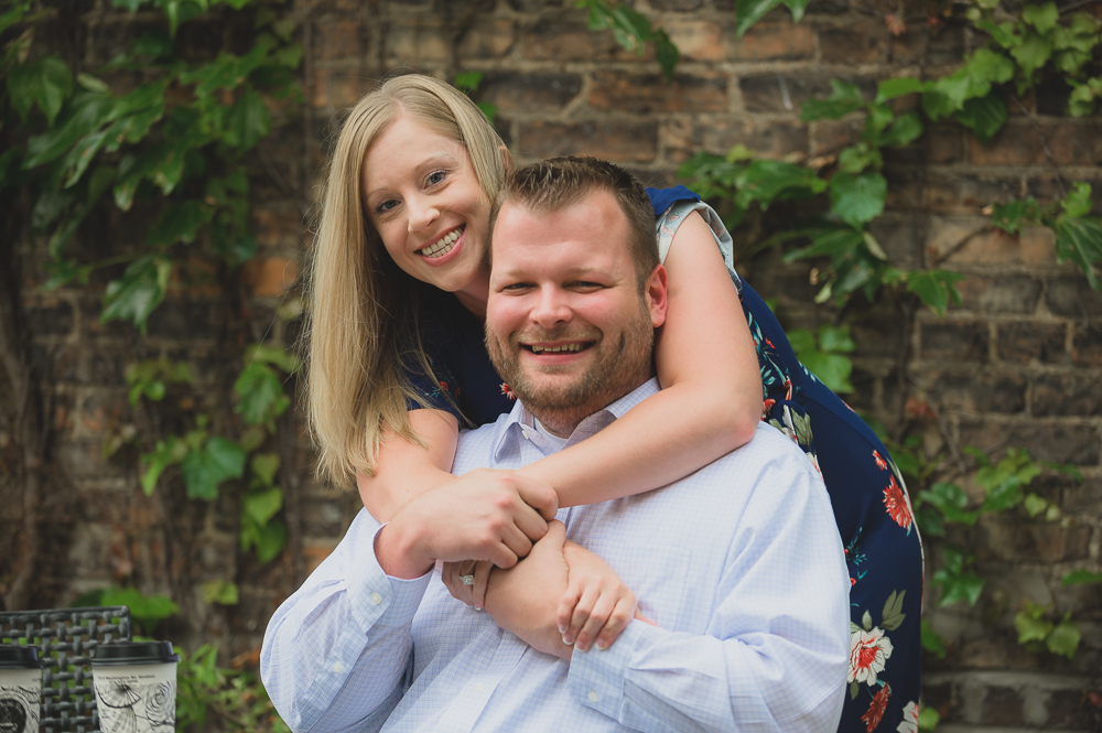  Engagement photos in downtown Goshen Indiana.  Outdoor urban photos in Shanklin Park by wedding photographer. 