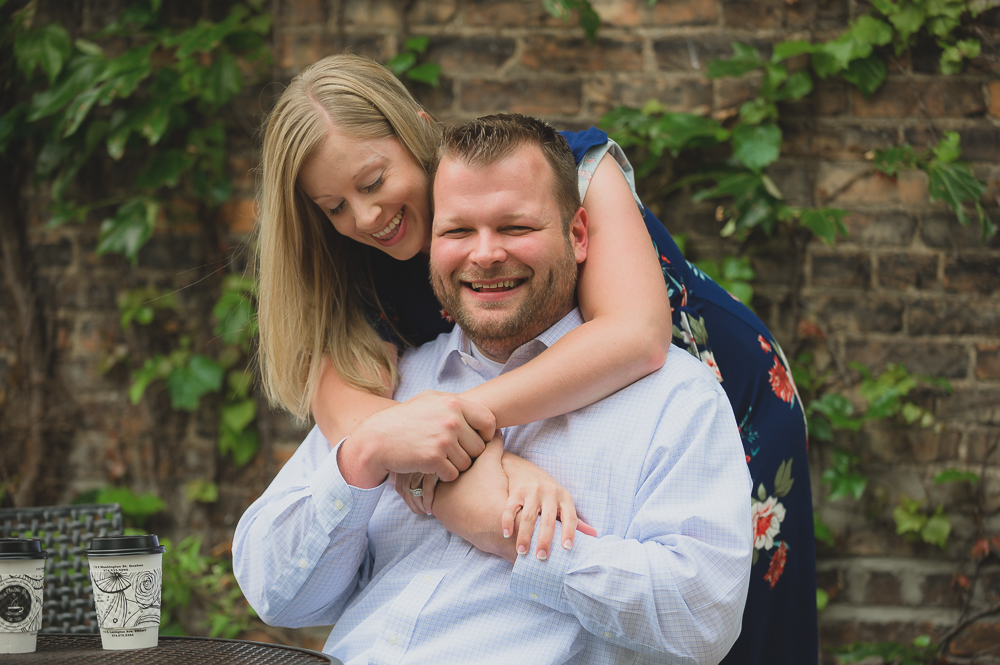  Engagement photos in downtown Goshen Indiana.  Outdoor urban photos in Shanklin Park by wedding photographer. 