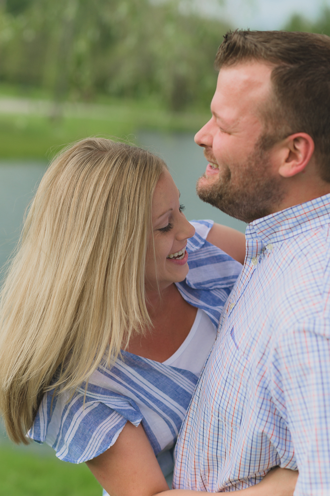  Engagement photos in downtown Goshen Indiana.  Outdoor urban photos in Shanklin Park by wedding photographer. 