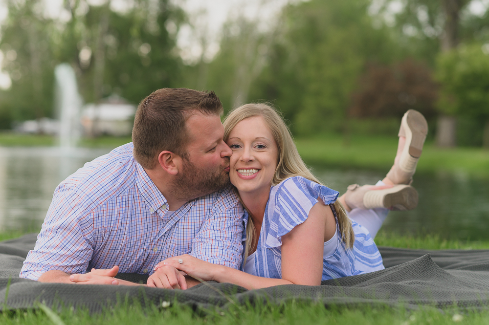  Engagement photos in downtown Goshen Indiana.  Outdoor urban photos in Shanklin Park by wedding photographer. 