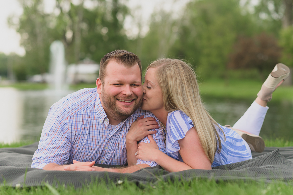  Engagement photos in downtown Goshen Indiana.  Outdoor urban photos in Shanklin Park by wedding photographer. 
