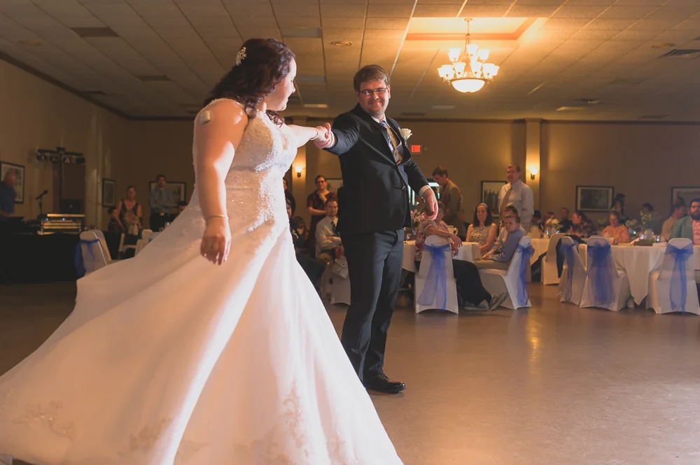 Wedding reception photo of dancing bride by South Bend wedding photographer