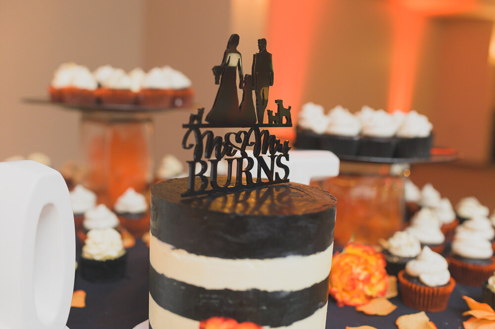 Orange black wedding cake