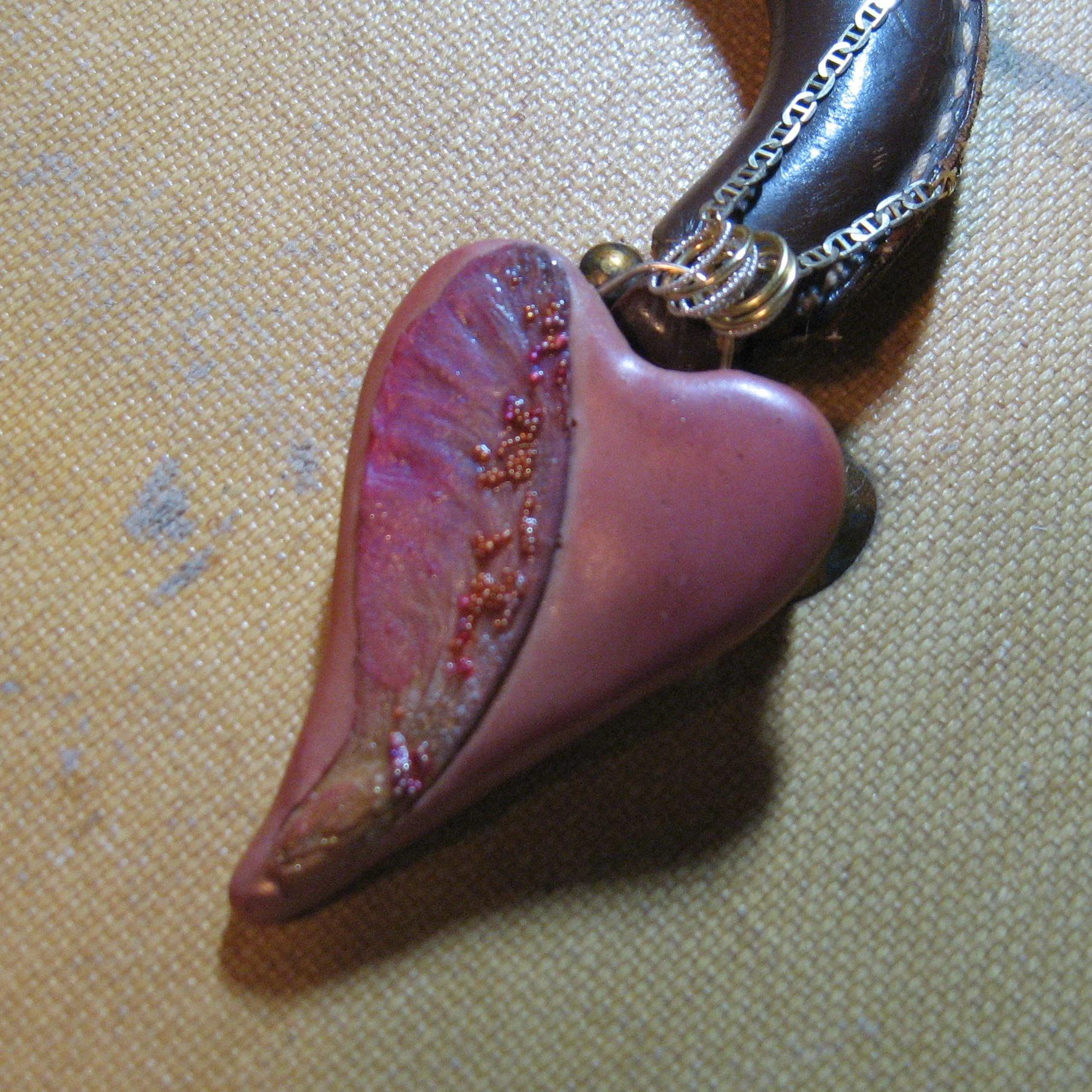 This was a real maple seed that I embellished and put on a heart. No art is as beautiful as nature's!