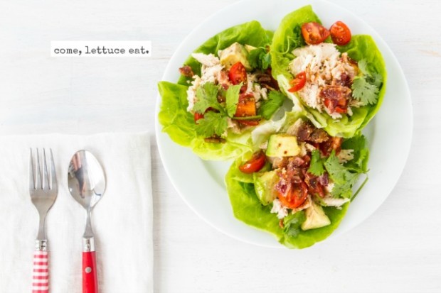 BLAT LETTUCE WRAPS INGREDIENTS: 1 (12.5 ounce) can cooked chicken breast, drained 2 tablespoons vinegar 2 tablespoons olive oil 1 avocado, diced 1 large tomato, diced 1/4 cup bacon bits salt & pepper cilantro 8 Bibb lettuce leaves DIRECTIONS: 1. In a large bowl, shred chicken. 2. Drizzle with vinegar and olive oil 3. Salt and pepper to taste. 4. Spoon into lettuce cups. 5. Top with avocado, tomato, bacon bits, and cilantro. 6. Enjoiiii! Serves 4.