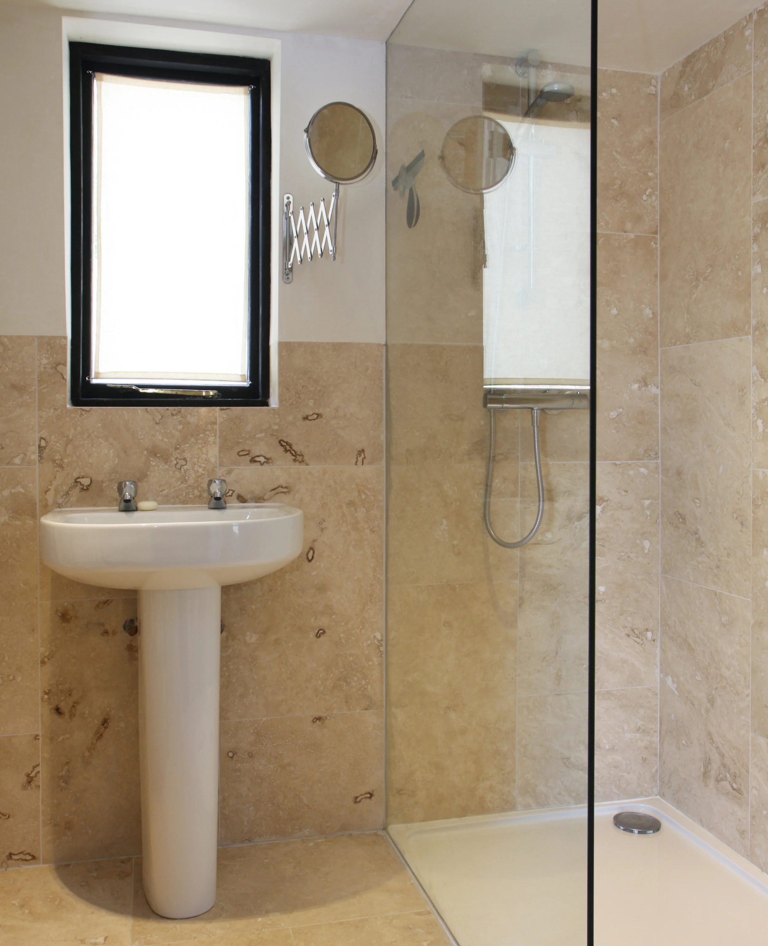 Downstairs there is a beautifully finished shower room and WC.