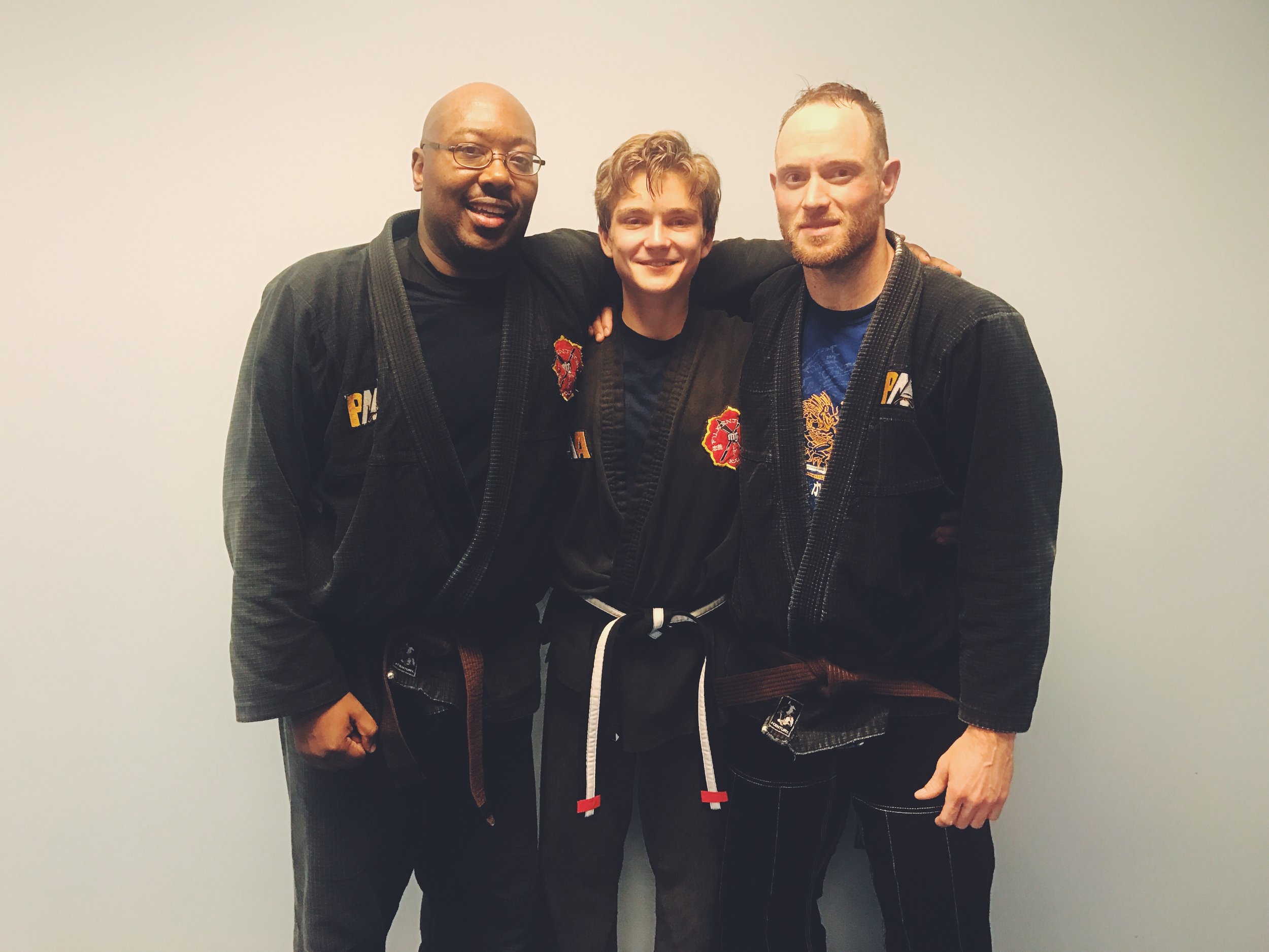 Matt alongside two of his training partners and Black Belt Test partners, Monty and Iain!