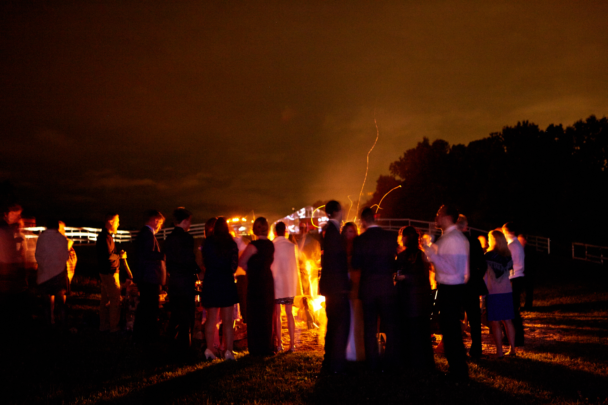 fire pit with greenhouse in the background.jpg