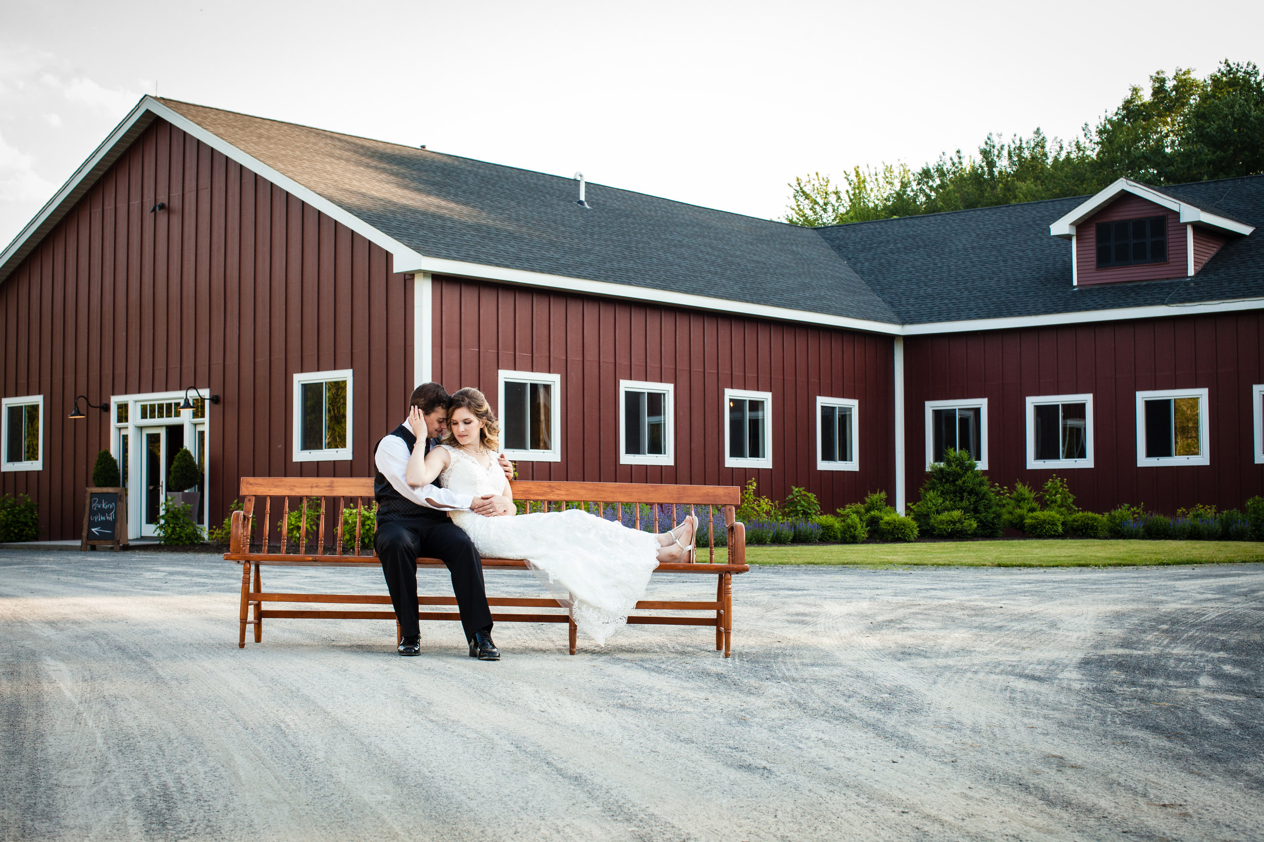 B+G on bench in front of barn.jpg