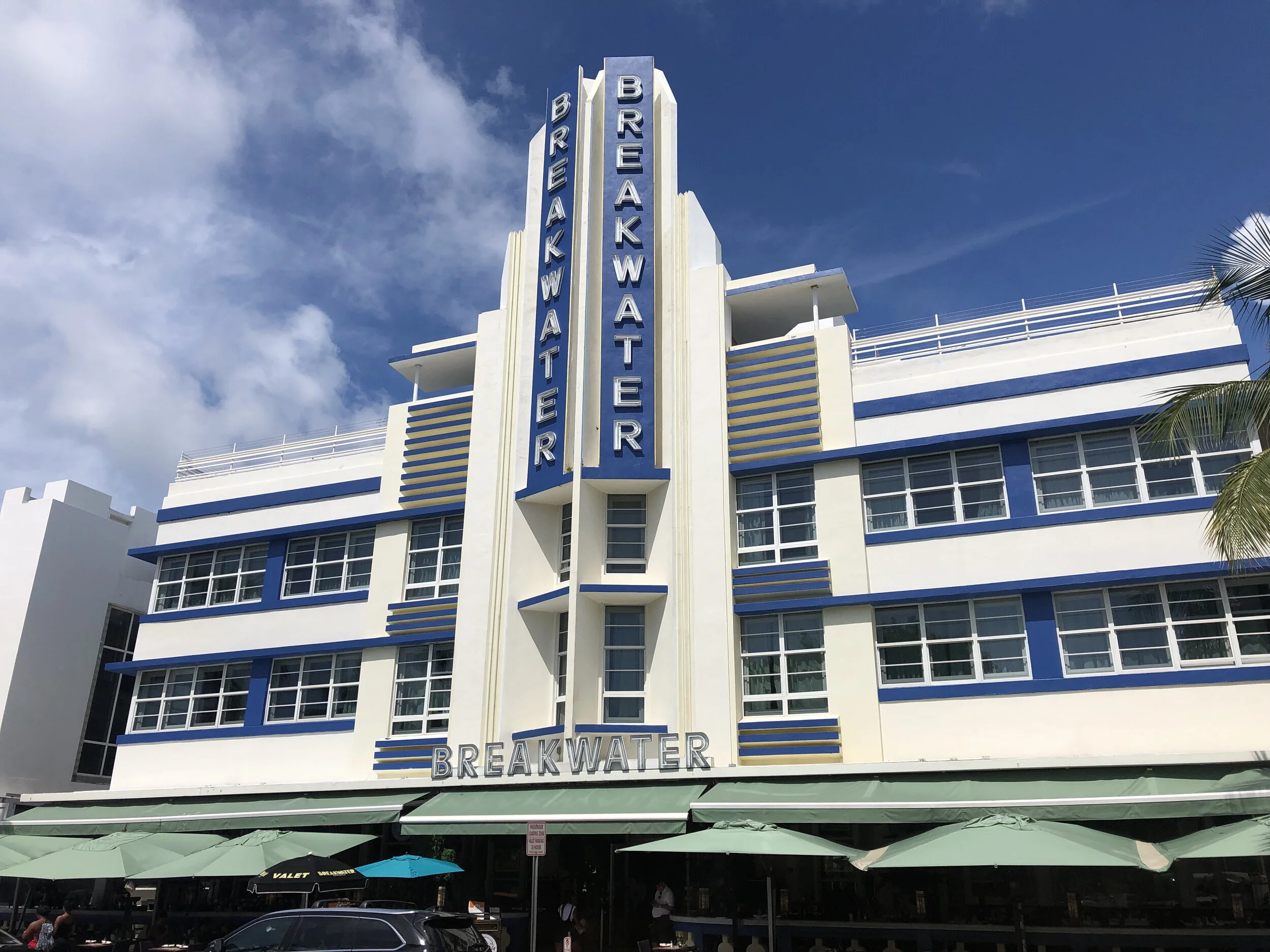 Opened in 1936, The Breakwater is pure Art Deco, with an emphasis on symmetry and clean, colorful lines. Designed by Anton Skislewicz, the hotel’s electric blue and neon-lit central tower epitomizes Miami Beach.