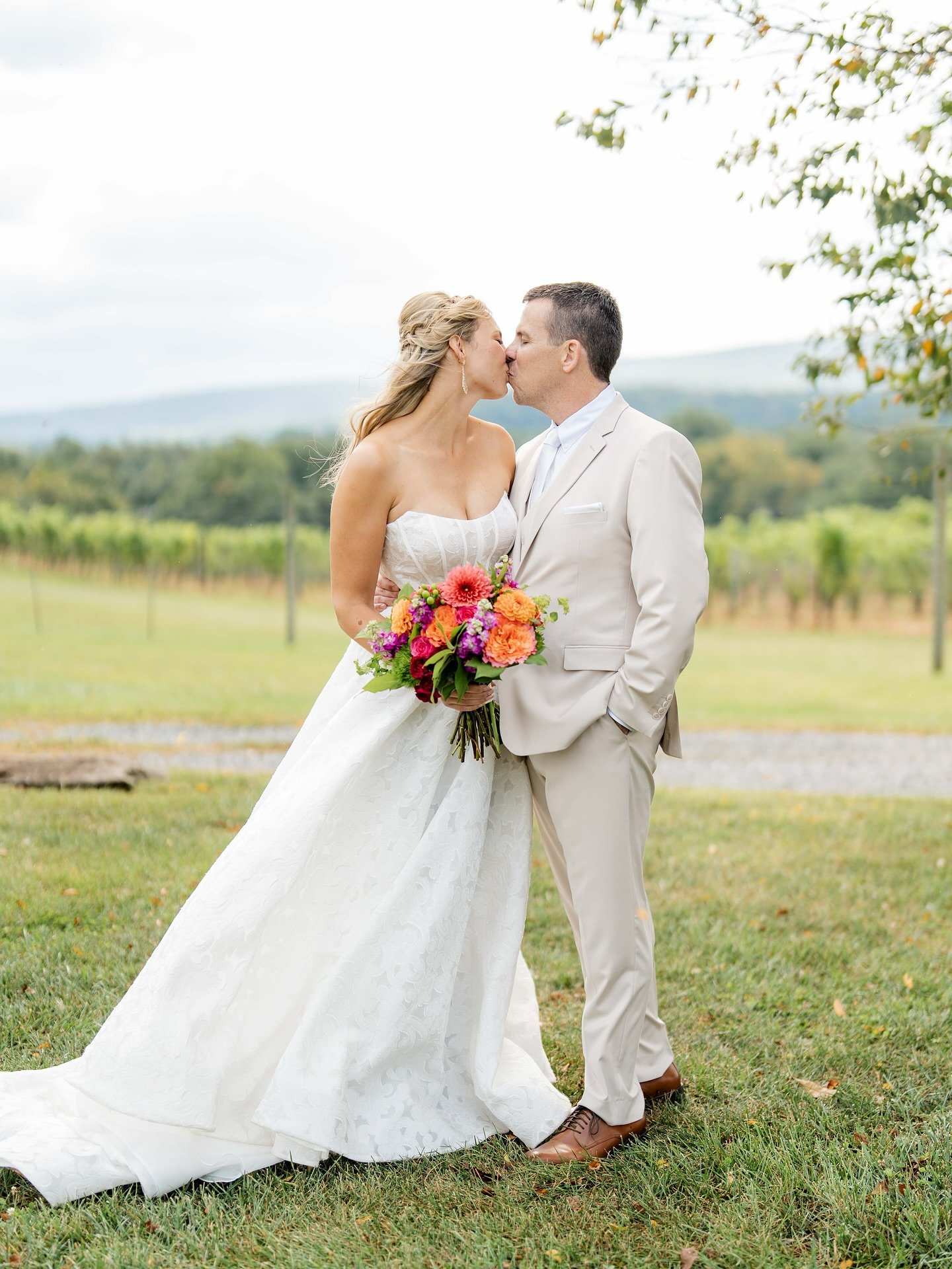 My goodness - the colors, the soft sunlight, the poodles, the confetti!! Congratulations to these two 💐