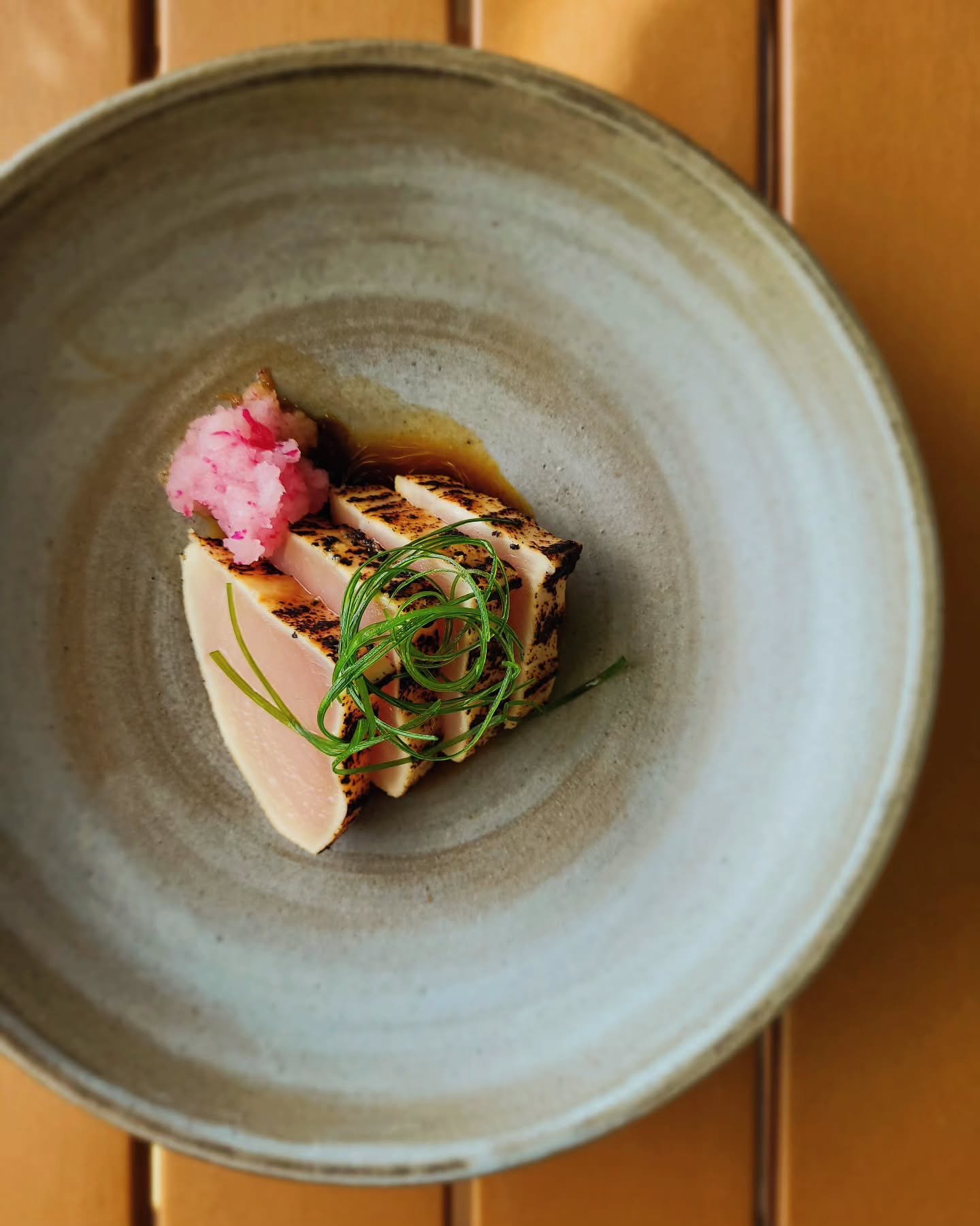 Our snack game is stronger than ever. We've added some exciting new options to our dinner menu, including this albacore dish featuring @stjudetuna . 🐟 Enjoy rare albacore tuna with daikon, green onion, and malt.
