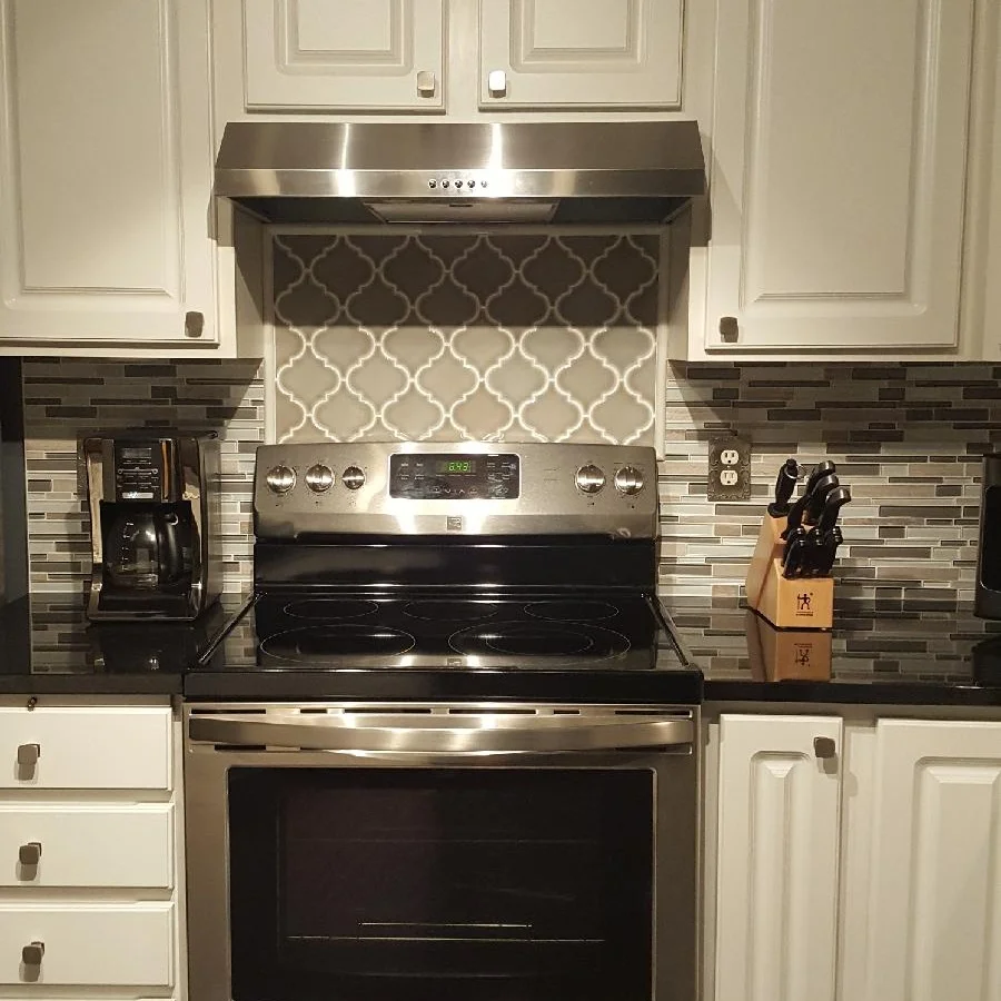 Framed Mosaic Tile Above Stove