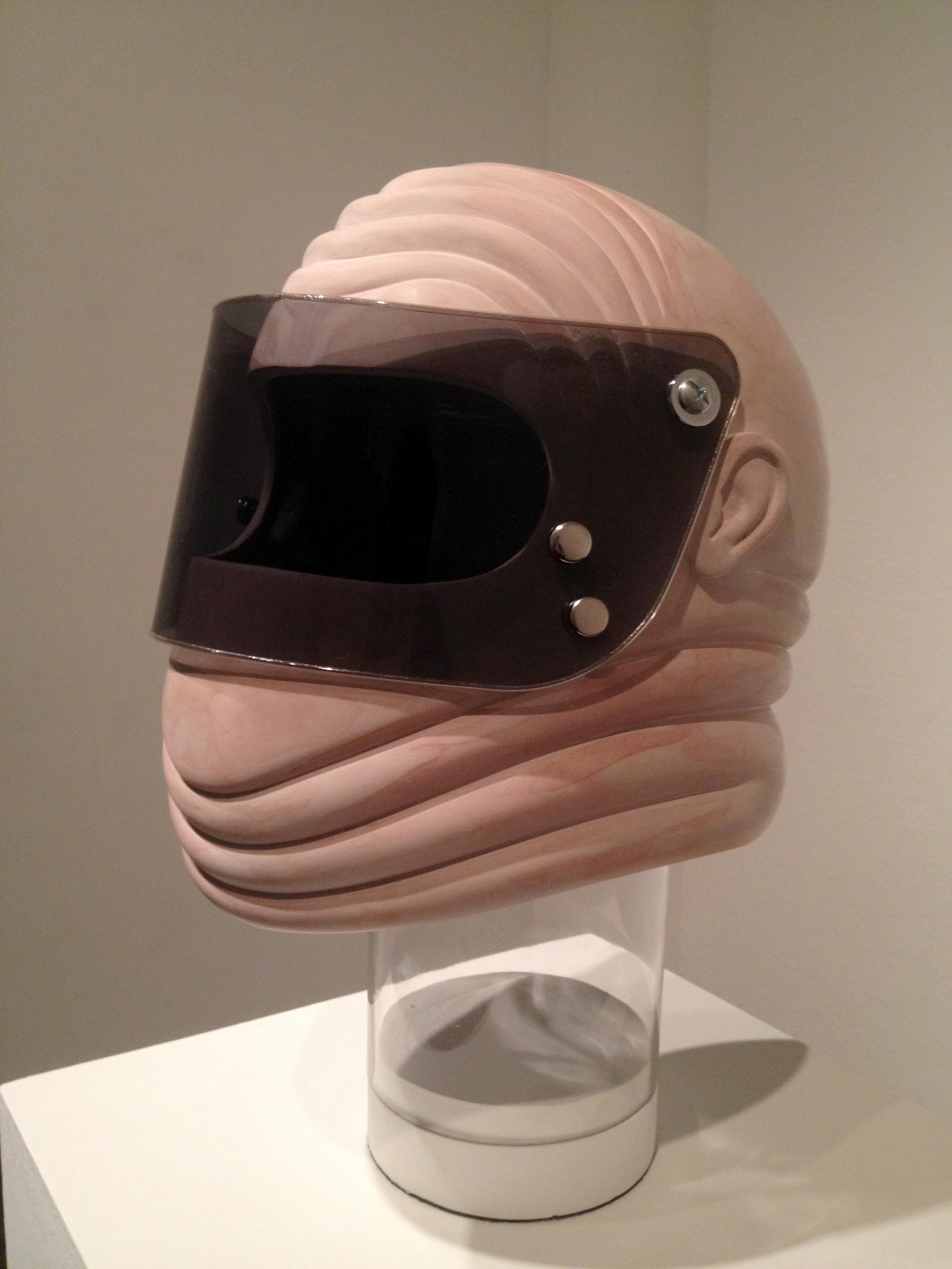    fat dickhead , 2014.    Bondo  ®&nbsp;  body filler putty, fiberglass, plexiglass, brass snaps, styrofoam.     11" x 13" x 13".  