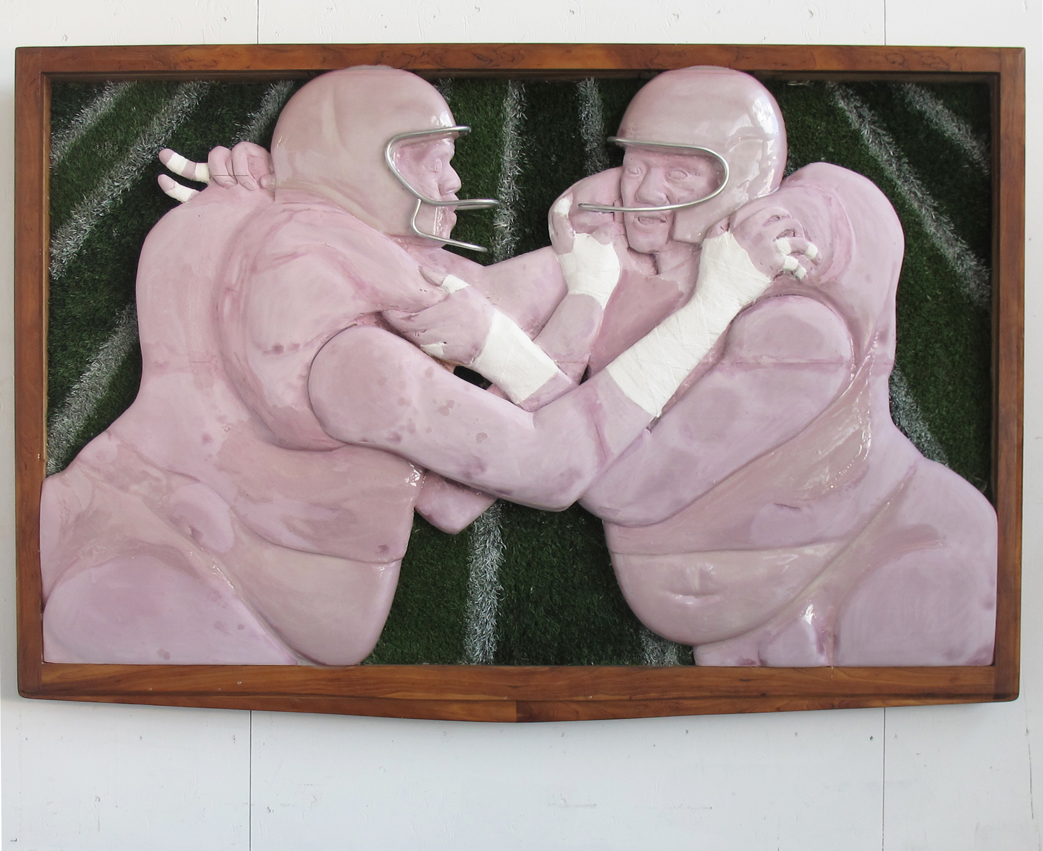   tuesday night football,&nbsp; 2015.&nbsp;  extruded polystyrene, plaster bandages, mahogany, field turf, spray paint, aluminum armature wire, acrylic resin.  78" x 50" x 8".&nbsp; 