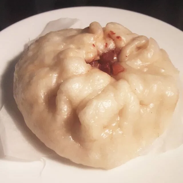Tried my hand at bao, leavened with my sourdough starter. Inspired by char siu bao (BBQ pork bun), I stuffed it with pumpkin and pine nuts! 😋😋😋