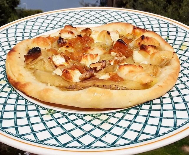 Made some sourdough pizzettas!
First one, charred smokey eggplant, bucheron goat cheese, walnuts and homemade loquat jam.  Sweet and savory! Delicious!
Second one, the classic Margherita: tomato pur&eacute;e, mozzarella fior di latte from Puglia, bas