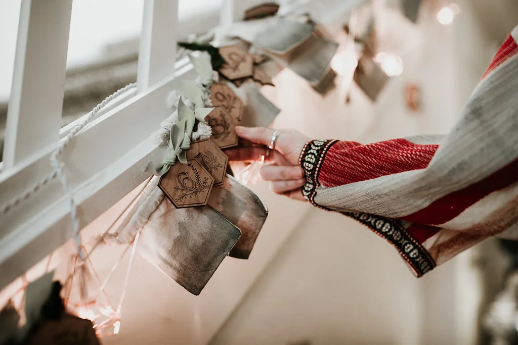 This beautiful handmade advent calendar is from Cardtorial and it may just very well be our first family herloom. It's intricate design sings straight to my heart. I know that it will stay in our famiy for ever and ever.