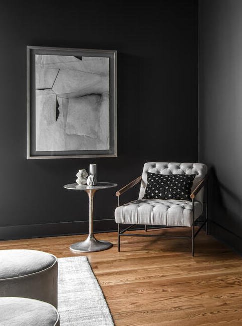 black_walls_tufted_chair_bedroom_minimal_interior.jpeg