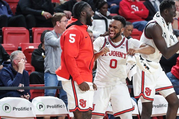 Kansas shoots lights out, handles Villanova 81-65 on the way to