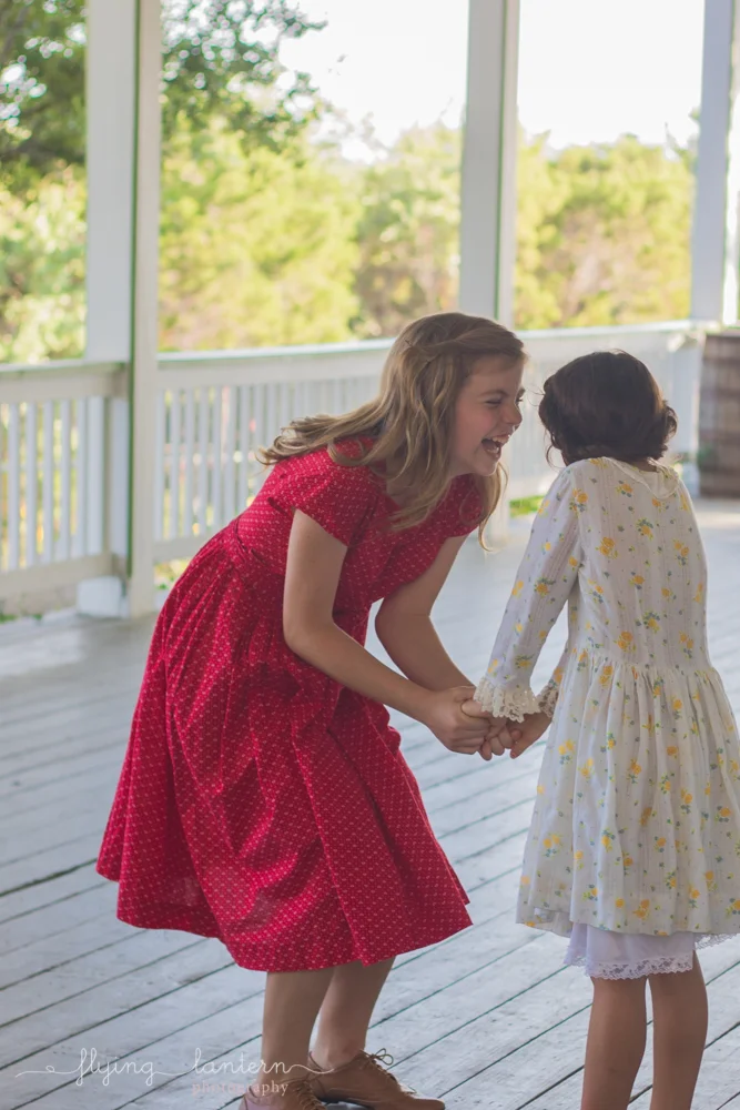 sisters smiling at each other
