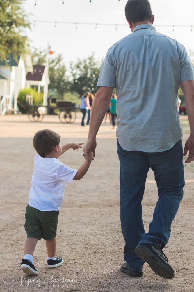 father walking with son
