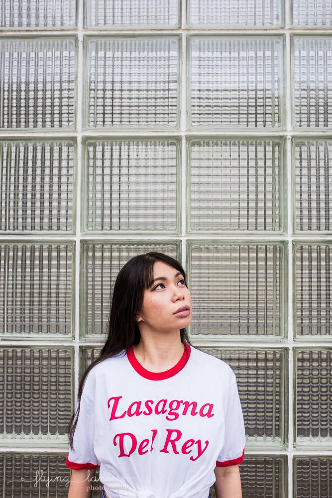 girl portrait in austin, texas at seaholm district wearing jeans photo by erin reas of flying lantern photography