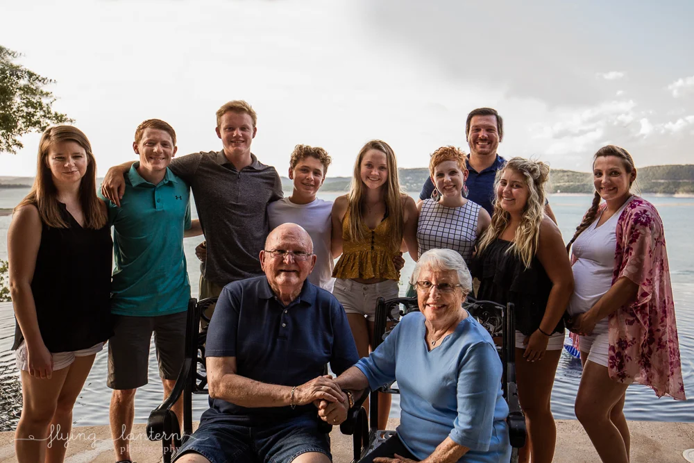 Extended family session on Lake Travis during family reunion. Grand kids and grand parents. Photo by Erin Reas of Flying Lantern Photography