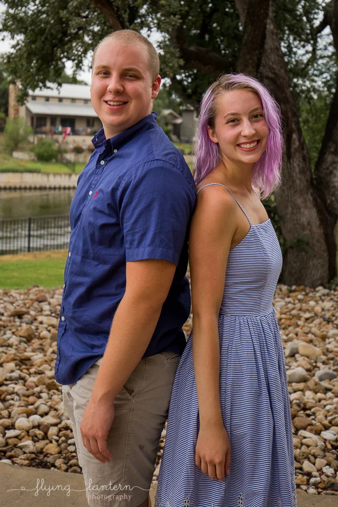 siblings during extended family portrait session while together for family reunion weekend in Kingsland, TX. Photo by Erin Reas of Flying Lantern Photography