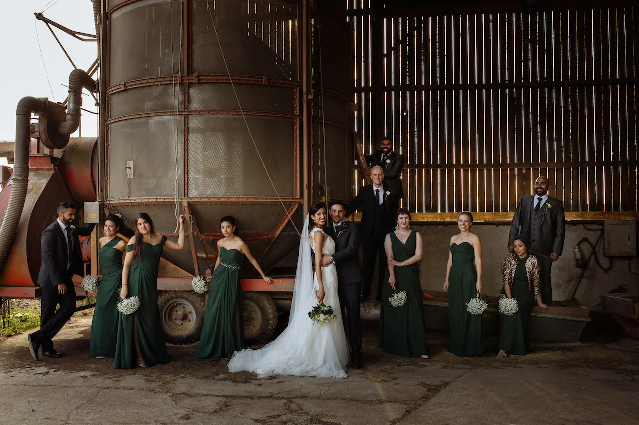 The bride, the groom, and their merry men (and women). Photo by toastofleeds.com)