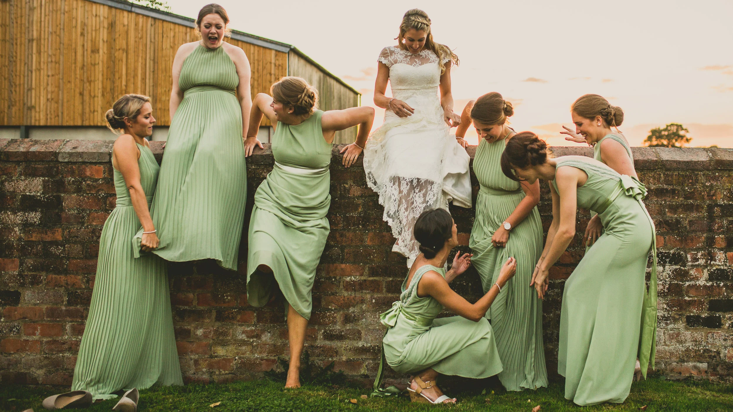 Off The Wall - Jess and her bridesmaids take time from the action. Image courtesy of lukebellphotography.co.uk.jpg