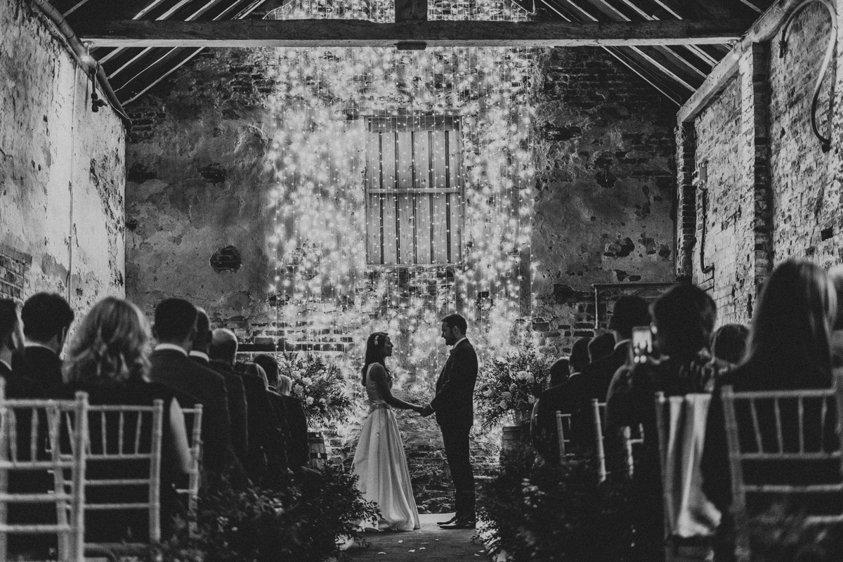 Doing the 'I do' in The Normans Ceremony Barn.jpg