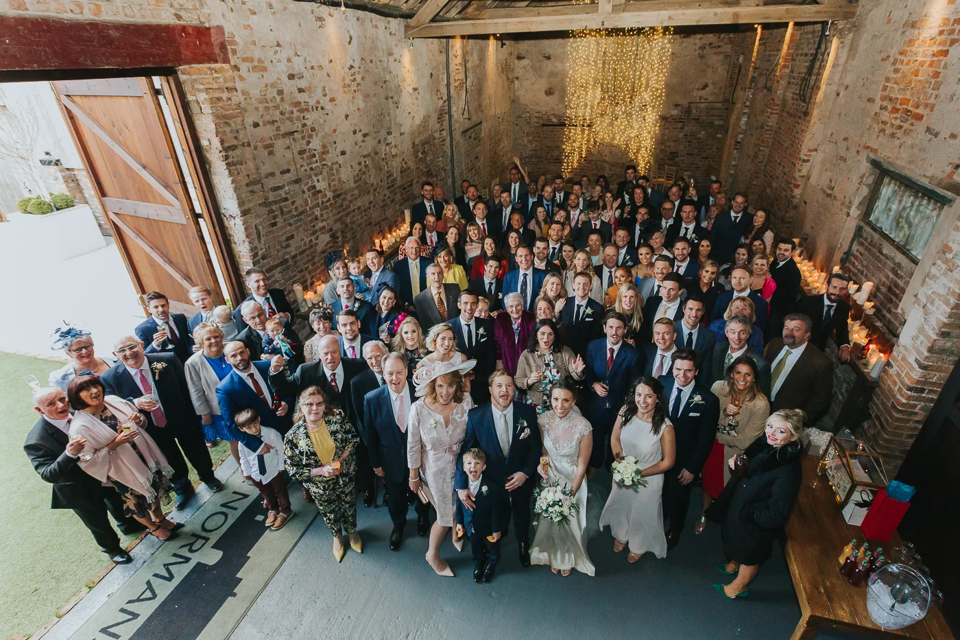 In the absence of a ceremony here at The Normans, the barn made for a great place for a group photo..jpg