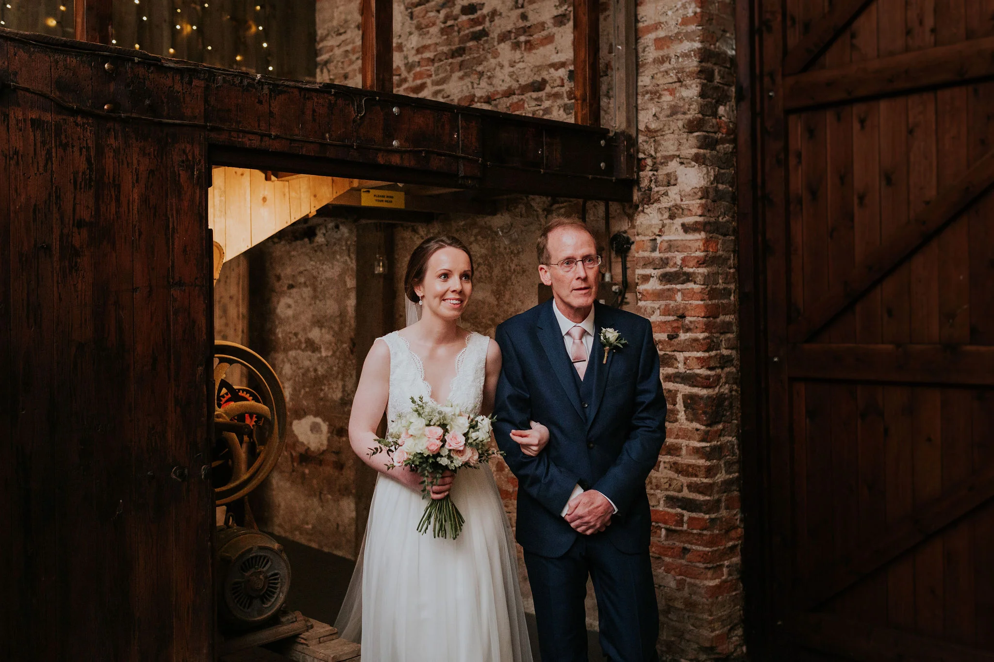 Katie and he proud Dad make their entry into The Normans Ceremony Barn.jpg
