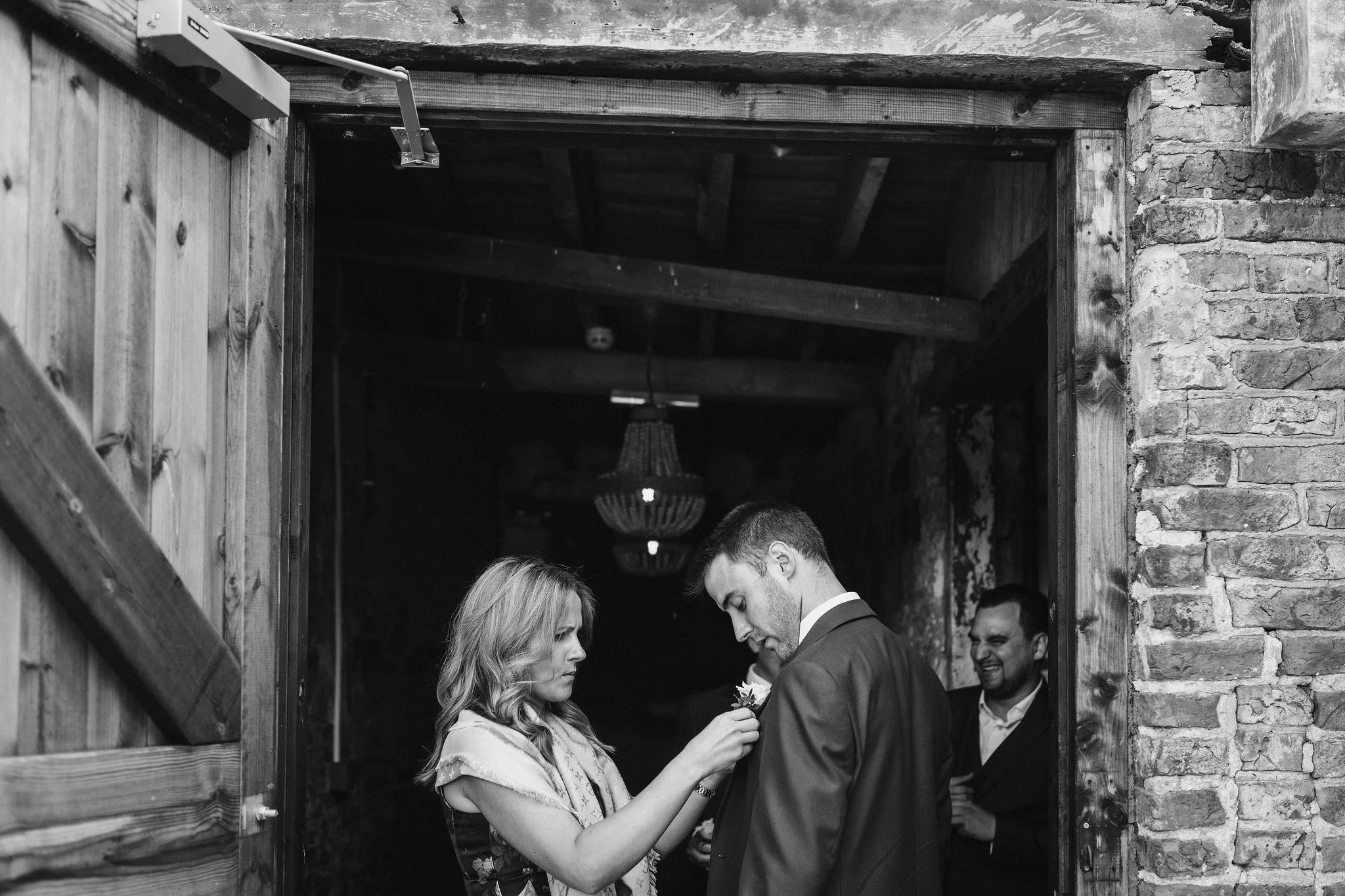 The final touches for Rob's wedding look.jpg