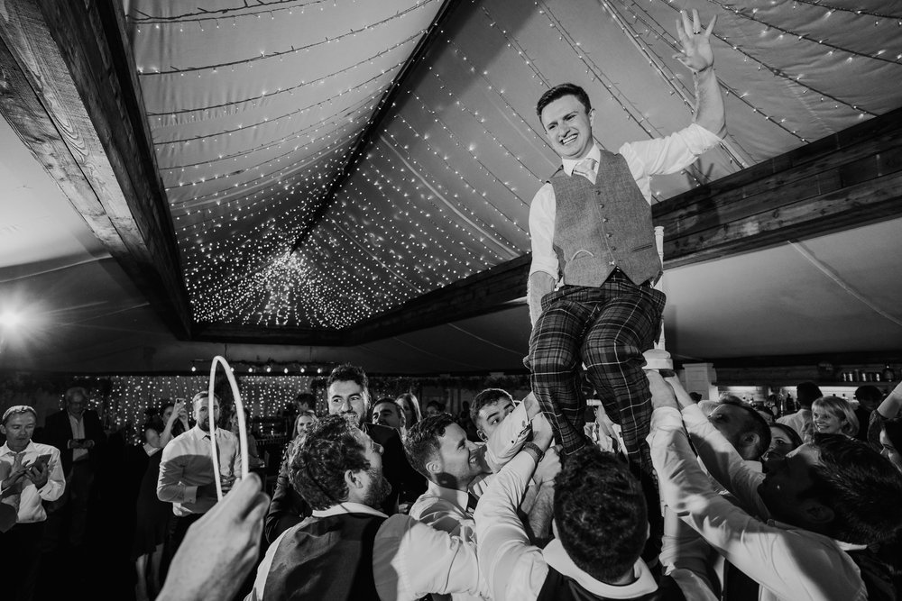 Groom goes wild on Normans wedding venue dance floor. Hamish Irvine.jpg