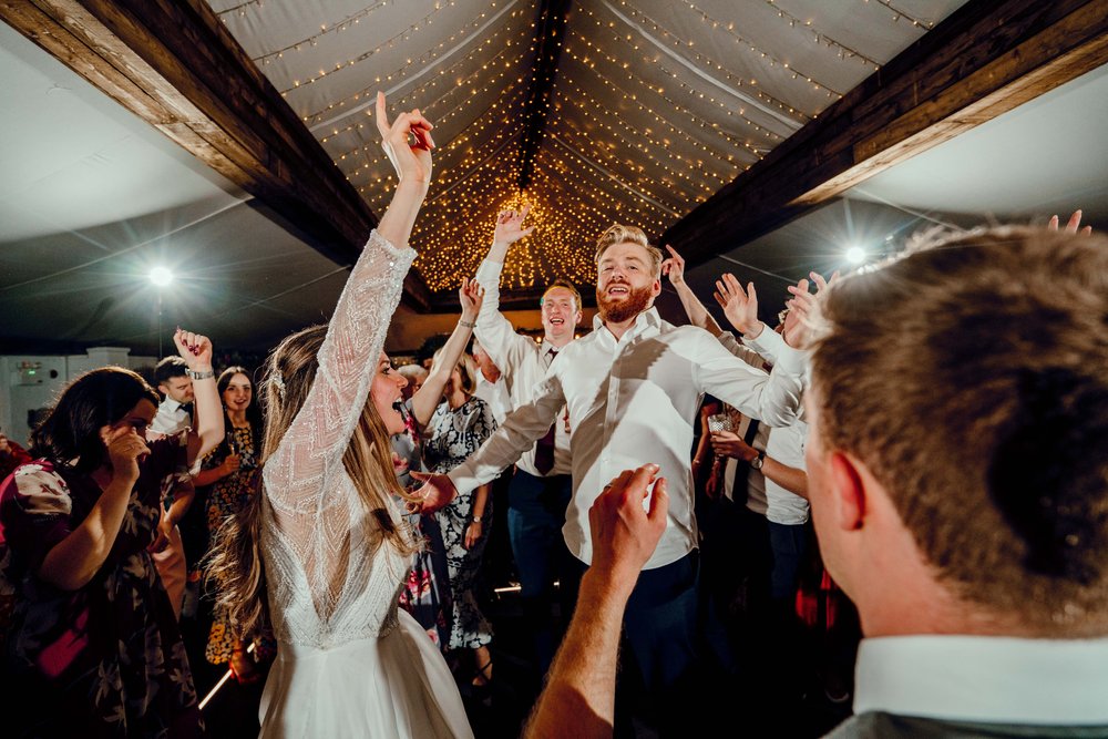 Party on Normans wedding venue dance floor. Hamish Irvine Photographer.jpg