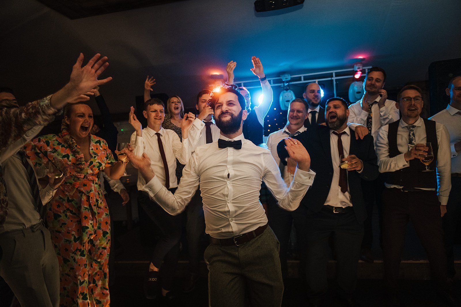 Nima leads the way on the dancefloor at The Normans wedding venue. Photo by Sugarbird Photography.jpg