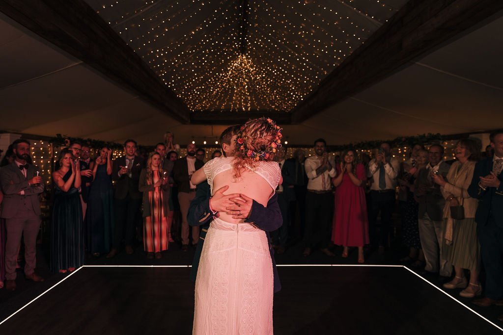 31_Bride and groom share first dance at The Normans wedding venue. Photo by Jules Barron (2).jpg