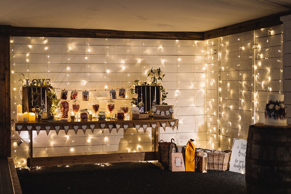 30_Cake and gift table in The Normans wedding venue Grain Shed. Photo by Lumiere Photographic.jpg