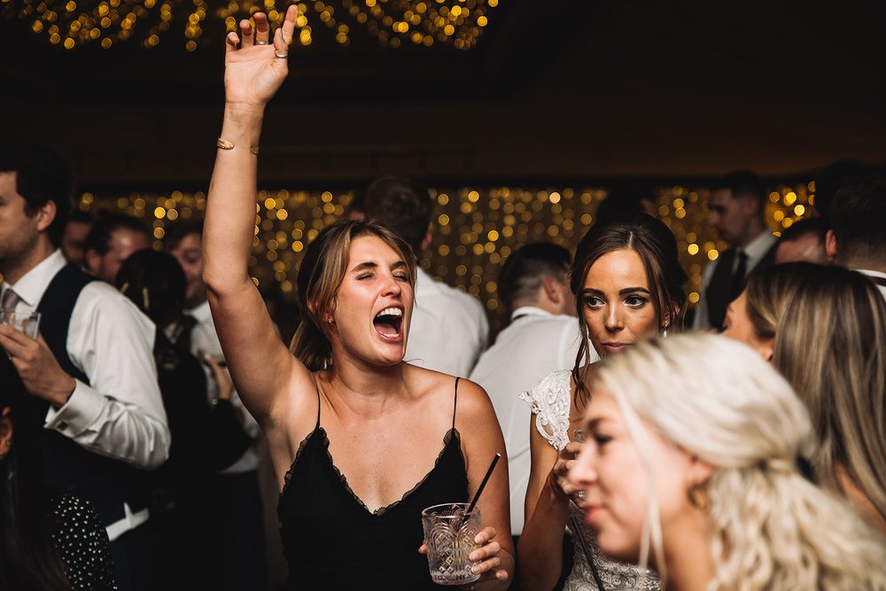 36b_Wedding guests on the dance floor at The Normans wedding venue. Photo by Lumiere Photographic.jpg