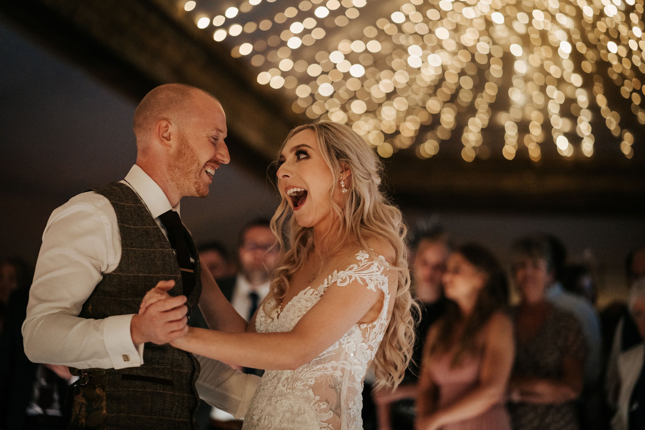 Smiles all round as bride and groom dance in The Normans Grain Shed. Image by photographybycharli.com.jpg