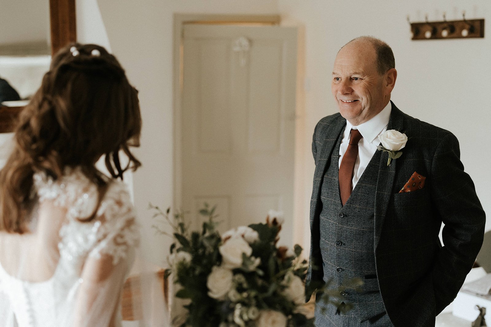 05_Bride and father of the bride in The Normans wedding venue Cottage. Photo by Monkeymole.jpg