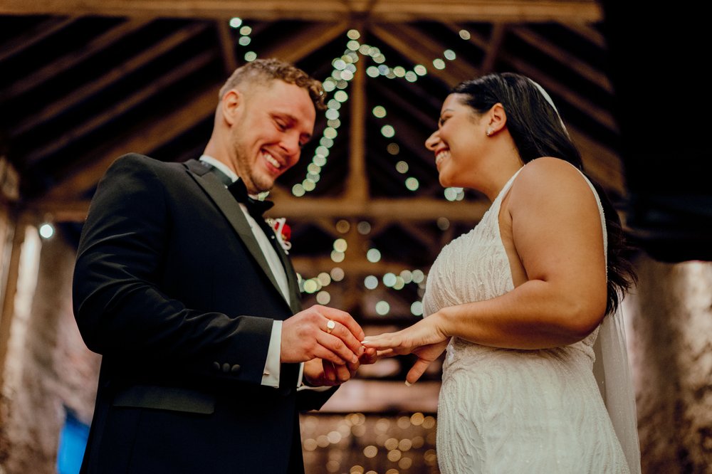 03b_Bride and groom exchange vows in The Normans wedding venue Ceremony Barn. Photo by Hamish Irvine (3).jpg