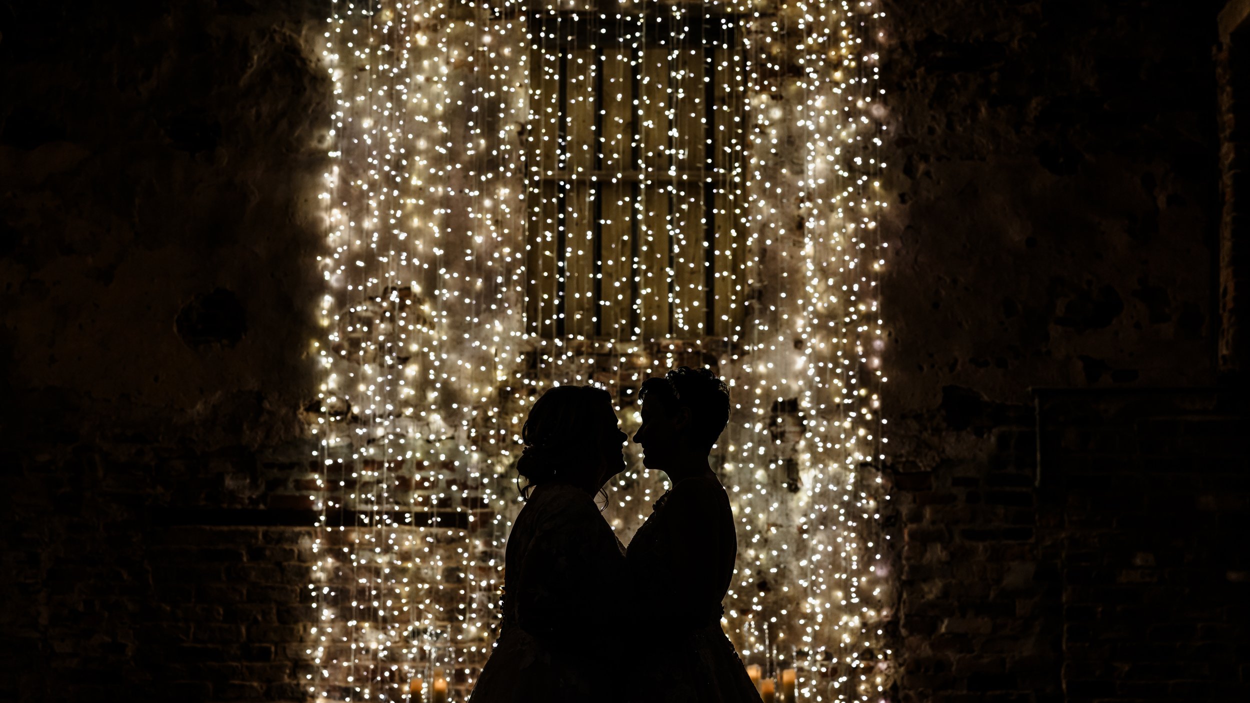 Brides in Normans wedding venue Ceremony Barn. Photo Robert Carter (4).jpg