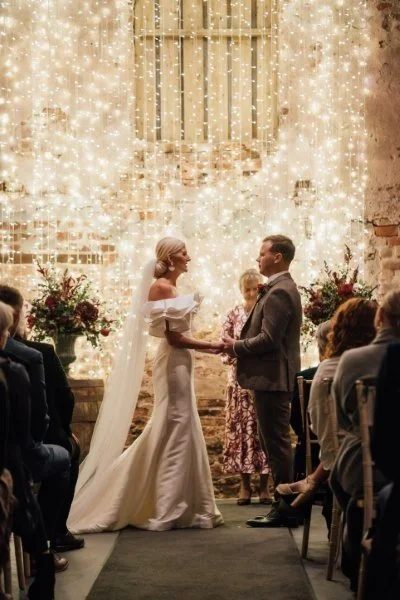 02_Bride and groom exchange vows in The Normans Ceremony Barn. Photo by Bloom (10).jpg