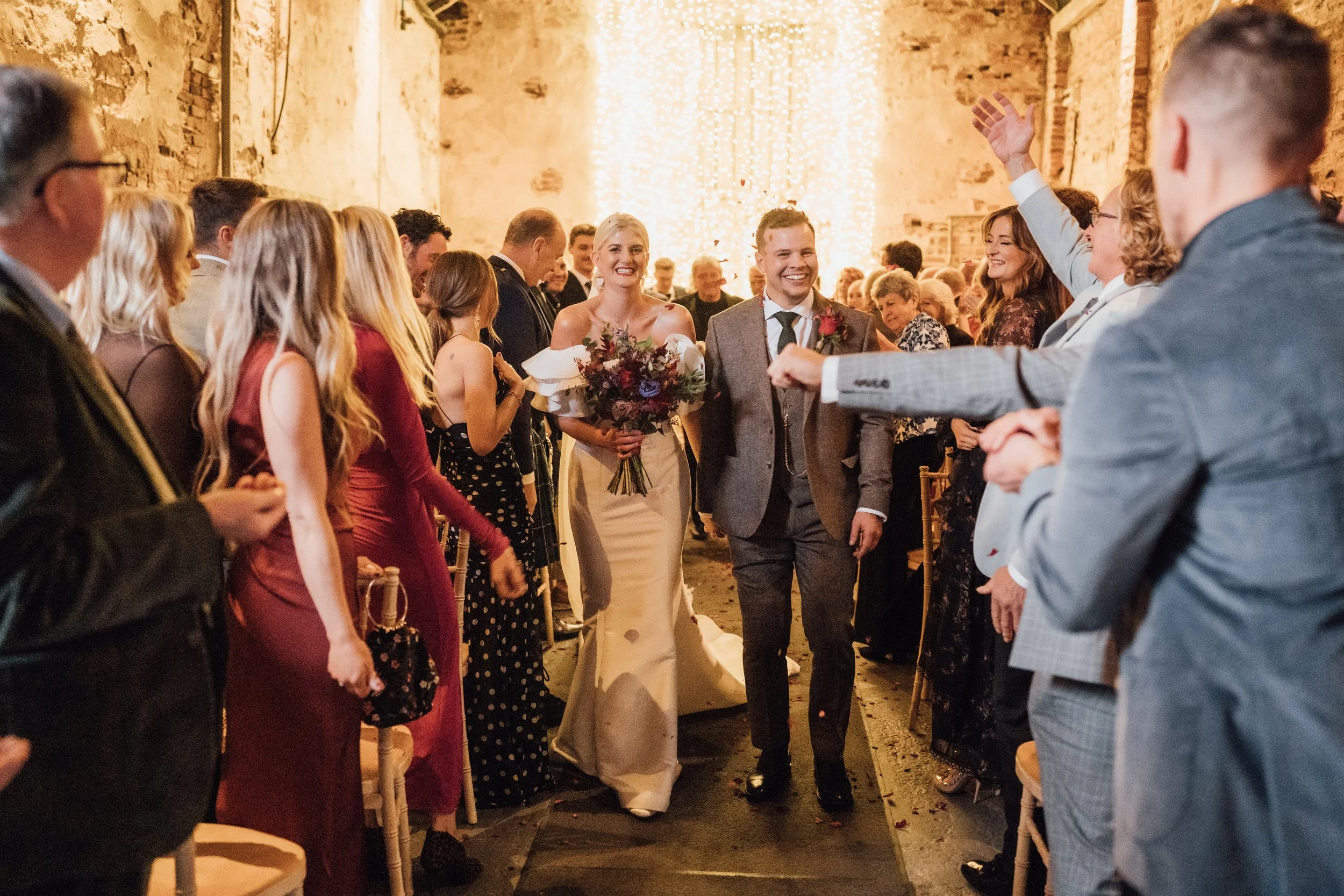 02_Confetti is thrown in The Normans Ceremony Barn. Photo by Bloom (2).jpg